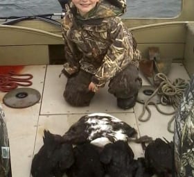 Young boy and the game he hunted